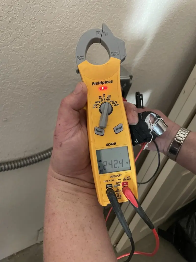 Voltage testing with clamp meter during Hot Tub / Pool Electrical Wiring in Moulton